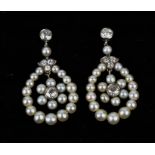 A pair of 18ct white gold (tested), diamond and pearl drop earrings, with single diamonds approx 0.