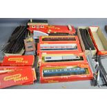 Hornby and Triang trains, some boxed, together with track.