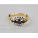 An 18ct gold, sapphire and diamond ring, 2.5g.