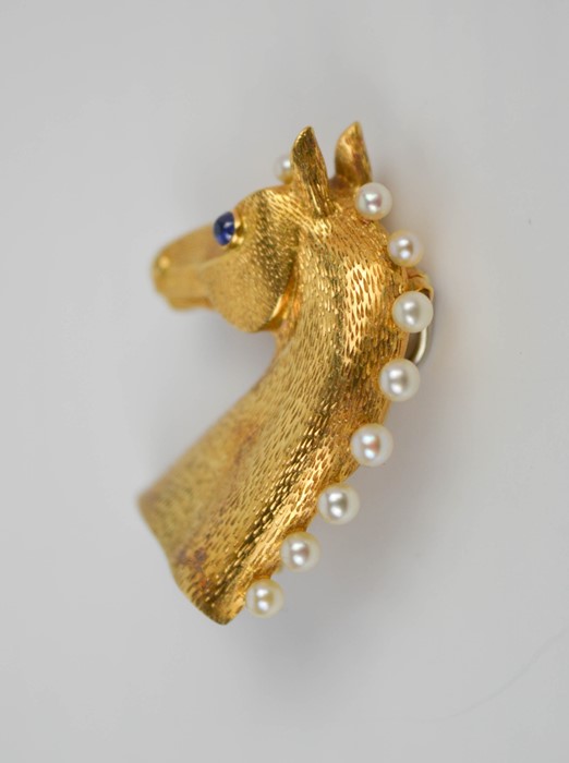 An 18ct gold Cartier brooch in the form of a horses head, finely engraved with detail, inset with - Image 3 of 9