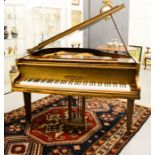 A Monington & Weston of London baby grand piano.