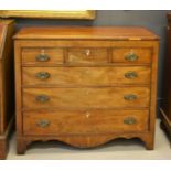 A Regency mahogany chest of drawers, with three short over three long graduated drawers, and