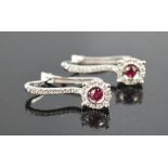 A 18ct white gold and ruby pair of earrings, hoop / drop, 3.8g.
