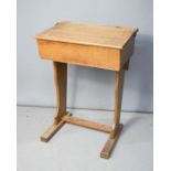 A vintage pine school desk.