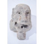 A Mediaeval stone carved gargoyle, 32cm high.