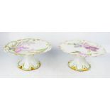 A pair of comports, Limoges, painted by E. Lang, signed to the base.