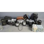 A group of cameras and lenses including Petri FTII camera and lens, Agfa Ambi Silette camera, lenses
