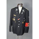 A German Allgemeine SS tunic and belt, to include Nazi armband, badges including Iron Cross,
