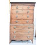 A Regency mahogany tallboy / chest on chest, with a dentil moulded cornice, canted corners, the