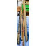 A quantity of antique vintage fly fishing rods split cane and carbon example.