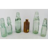 A group of local collection antique bottles, including Stamford, Bourne, March, and a Denby stone