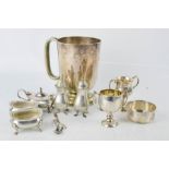 Two silver trophy's, a silver dish, together with silver plated salts, tankard and other items, 2.