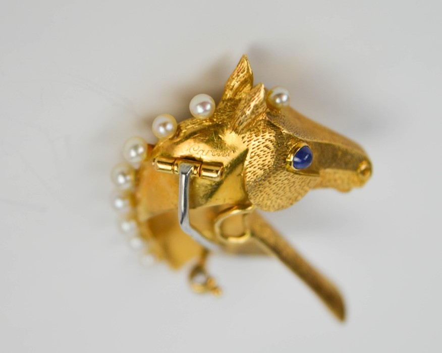 An 18ct gold Cartier brooch in the form of a horses head, finely engraved with detail, inset with - Image 4 of 9