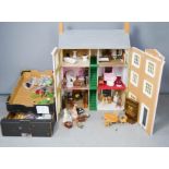 A large Georgian style dolls house, with quantity of furniture.