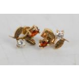 A pair of 9ct gold earrings, set with diamond and garnet.