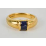 A Tiffany & Co 18ct yellow gold and sapphire ring, size L, 5.6g.