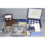 Twenty four Brilliant uncirculated and silver proof European and World coins, some with certificates