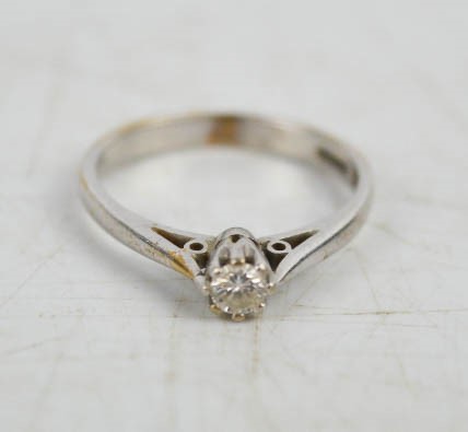 A 9ct gold and diamond solitaire ring, size O, 2.4g.