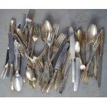 A quantity of flatware with 90 grade silver handles.