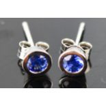 A pair of 18ct white gold and sapphire stud earring, 1.2ct sapphires in total, 1.7g.