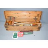 An antique croquet set, in original pine box.