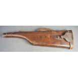 An antique leather gun case, bearing initials R.E.P.
