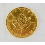 A Canada fine gold 1oz pure 22ct gold coin.