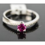 An 18ct white gold, diamond and pink sapphire ring, approx 0.4cts, size P, 3.5g.