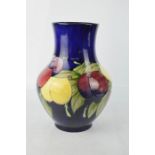 A Moorcroft vase.