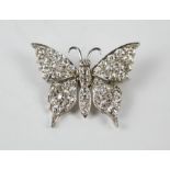 A fine 18ct white gold and diamond butterfly brooch, with fifty three diamonds totalling