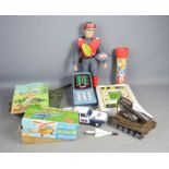 A boxed battery operated Helicopter, Eutex Soccer, Milton Bradley game, Kaleidoscope and Carlton