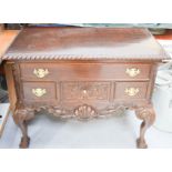 A mahogany lowboy, with one long drawer over three small drawers, 83 by 96 by 47cm.