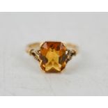 A 9ct gold and citrine ring, size K-L, 2.4g.