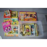 A quantity of jigsaws, vintage and 1980s examples including Whirly Wheelers, Magic Diaper and