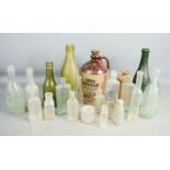 A quantity of local interest excavated bottles and 19th century glass panes.