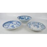 Three 20th century stoneware glazed blue and white dishes and one bowl, each with calligraphy
