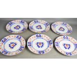 A set of six New Stone red, blue and white stoneware glazed plates. [Entire proceeds of sale will be