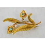 A gilt metal brooch, set with turquoise and pearl drops, 5.9g.