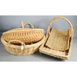 A group of wicker baskets of various form.