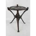 An African carved table.