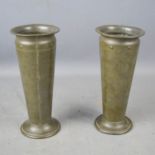 A pair of Arts & Crafts pewter bud vases, 20cm high.