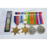 A medal group France & Germany Atlantic Stars and Defence Medal and Exemplary Police Service medal