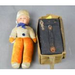 A vintage Hawkeye camera in canvas bag, together with a doll with porcelain head, 26cm high.