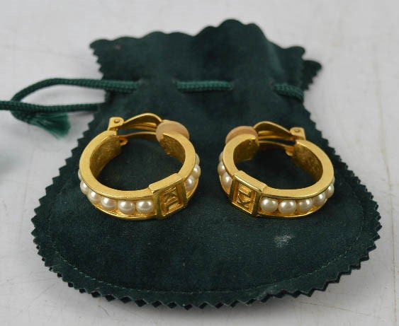 A pair of Karl Lagerfeld earrings, gilt metal and pearl.