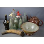 A quantity of vintage bottles, enamel kettle and Victorian sieve.