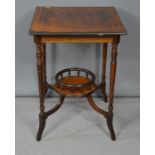 An Edwardian mahogany occasional table.