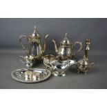 A tray of silver plate ware and other items including candlestick.