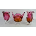 Three pink Murano glass vases.