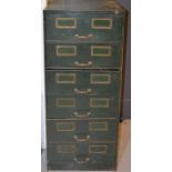 A mid-century green metal filing cabinet 132 by 55 by 62cm.