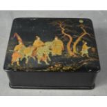 A Japanese black lacquered box, depicting figural scene, and containing costume jewellery.